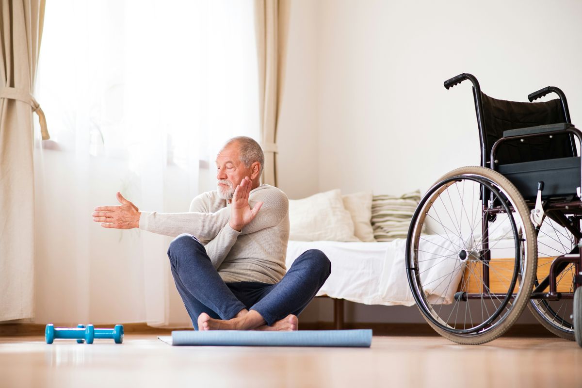 Elderly man stretching